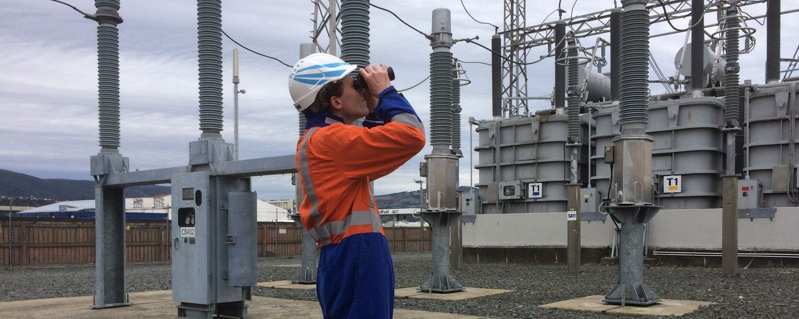 TL Surveys staff inspecting infrastructure at an electrical substation